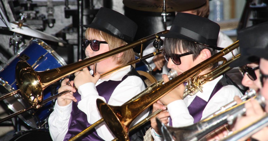 brass band members playing