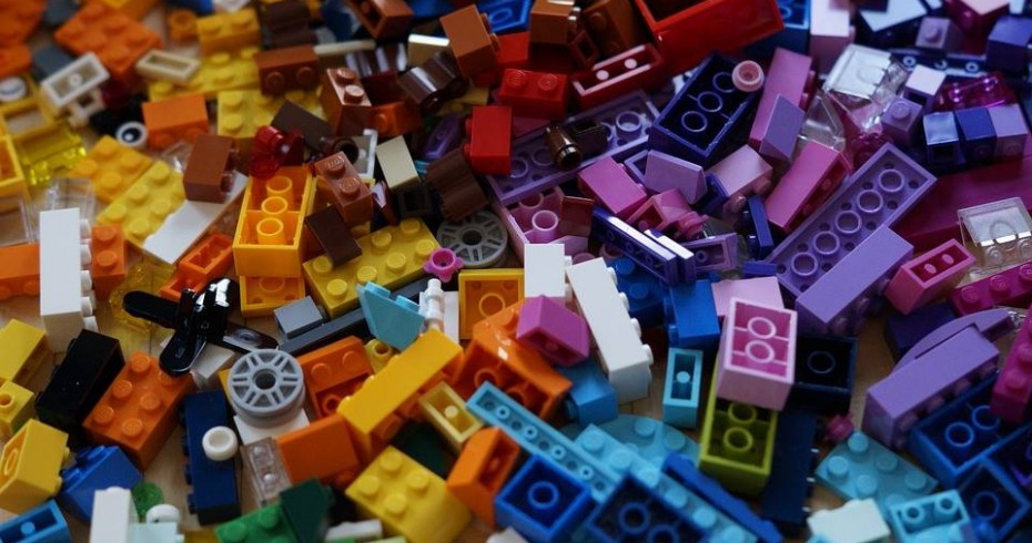 image depicting pieces of lego in a variety of coolours