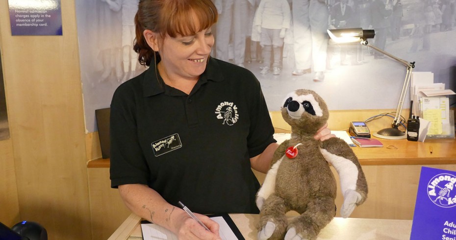 rhiannon from almond valley  with sloth, her soft toy