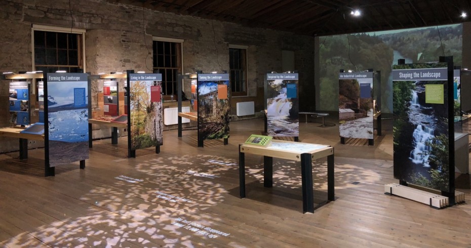 interior of gallery with exhibition panels on display