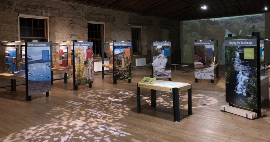 interior of gallery with exhibition panels on display interior of gallery with exhibition panels on display