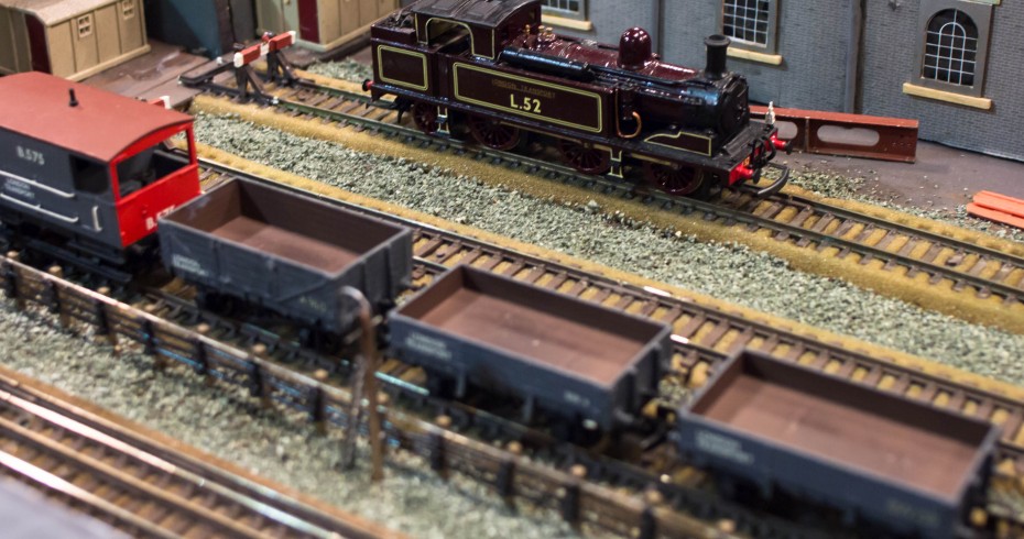 model railway with a L52 engine and another train with three wagons