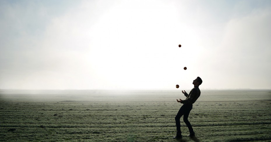 image of a juggler in a field