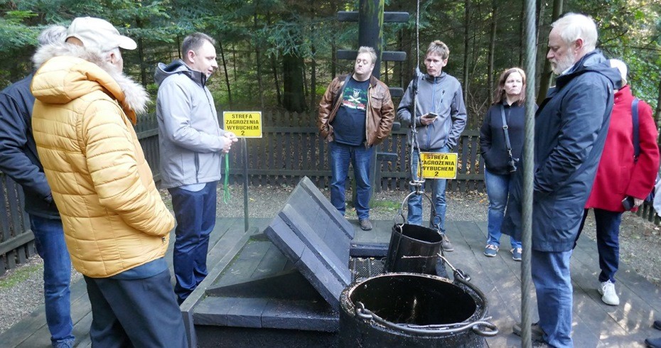 visitors at a shale oil mine in poland