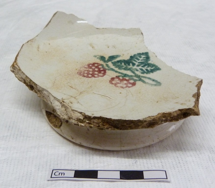 Sherd of spongewear bowl with strawberry and leaf motif