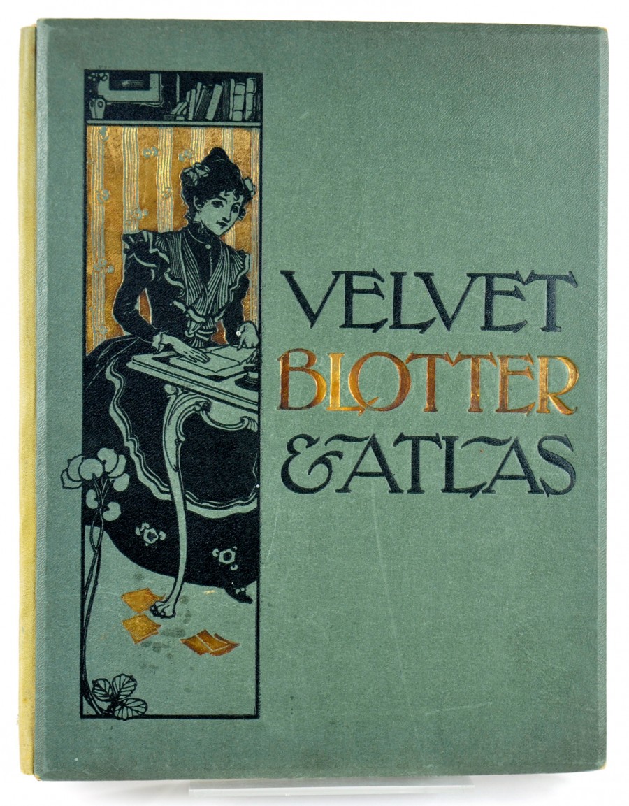 front page, velvet blotter and atlas, green front cover with image of lady sitting at a table