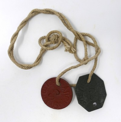Black and red leather dog tags belonging to Robert Aitchison image