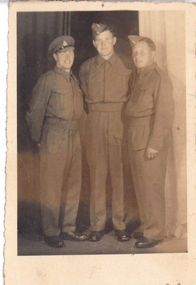 Photograph of Marine Robert Aitchison and two other POWs image