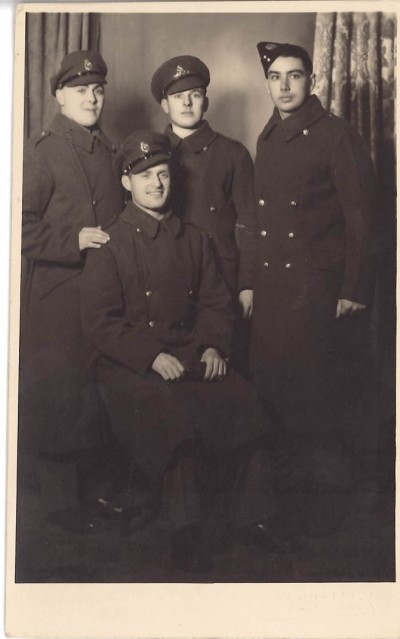 Photograph of four soldiers image